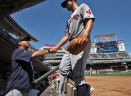 Cleveland Indians manager Terry Francona, left, congratulates starting pitcher Justin Masterson after he completed 7 innings against the Minnesota Twins at Target Field in Minneapolis, Minnesota, Sunday, July 21, 2013.