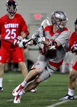 OSU sophomore midfielder Jesse King attacks the goal during a game against Detroit on Feb. 9 at the Woody Hayes Athletic Center. OSU won, 14-8.