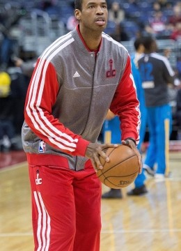 Washington Wizards center Jason Collins (98) warms up before their game against the New Orleans Hornets at the Verizon Center in Washington, D.C., March 15, 2013. Collins has become the first male professional athlete in the major four American sports leagues to come out as gay.