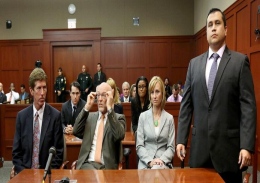 George Zimmerman stands when the jury arrives to deliver the verdict Saturday at his trial in Sanford, Fla. Zimmerman was found not gulity of second-degree murder in the fatal shooting of 17-year-old Trayvon Martin in 2012.