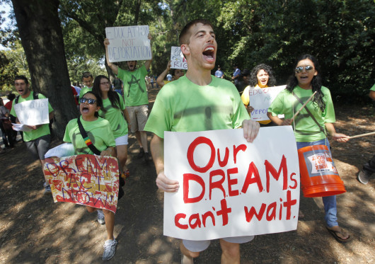 UNC-Chapel Hill students march outside Reynolds Coliseum at N.C. State with a coalition of student organizations voicing their support for the Dream Act and asking President Barack Obama to stop deportations, Sept. 14, 2011 in Raleigh, N.C.