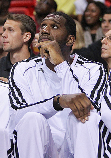 Miami Heat center Greg Oden watches from the bench during a preseason game against the San Antonio Spurs AmericanAirlines Arena Oct. 19. The Heat won, 121-96. Credit: Courtesy of MCT