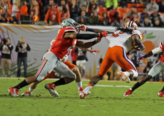 Junior wide receiver Sammy Watkins (2) pulls away as he runs with the ball. OSU lost against Clemson in the Orange Bowl Jan. 3, 40-35. Credit: Shelby Lum / Photo editor