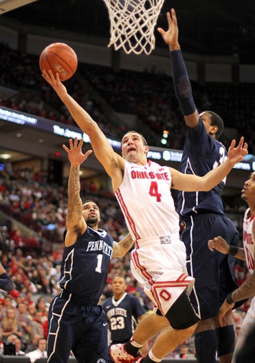 Senior guard Aaron Craft attempts a layup during a game against Penn State Jan. 29 at the Schottenstein Center. OSU lost, 71-70. Credit: Shelby Lum / Photo editor