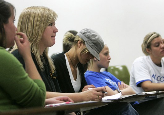 Resada Ward sits in a medical sociology lecture on the final day of class at Gustavus Adolphus, a small liberal arts college, May 13, 2009, in St. Peter, Minn. Credit: Courtesy of MCT
