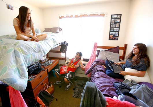 Students hang out in a dorm room at California State University-Northridge. Credit: Courtesy of MCT