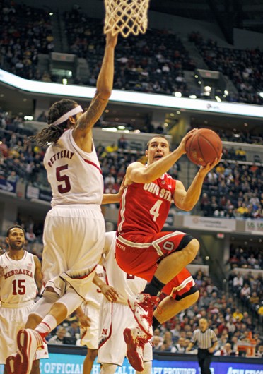 Then-senior guard Aaron Craft attempts a layup during a game against Nebraska March 14 at Bankers Life Fieldhouse. OSU lost, 71-67. Lantern file photo