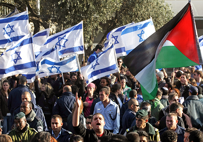 Almost 200 people took part in a demonstration held outside the Hebrew University in Jerusalem, Dec. 29, 2008, protesting the military operation in the Gaza Strip. The demonstrators held signs reading ‘Free Gaza’ and ‘Free Palestine’ and waved Palestinian flags.