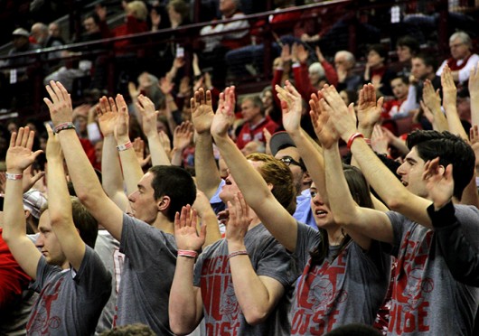 People in the student section cheer at an OSU men's basketball game at the Schottenstein Center. Credit: Ritika Shah / Asst. photo editor