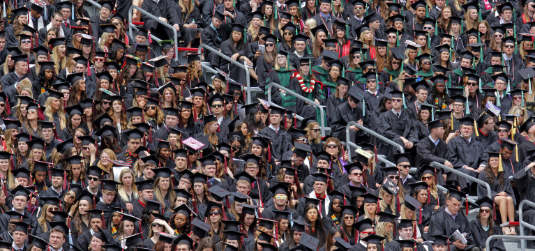 Students listen to the speakers at the spring commencement ceremony held May 4 at Ohio Stadium. Credit: Jon McAllister / Asst. photo editor