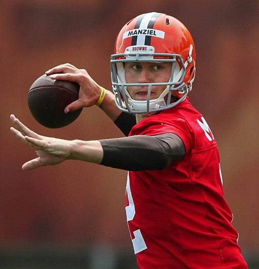 Cleveland Browns quarterback Johnny Manziel throws a pass during the organized team activities at the team's training facility in Berea, Ohio, on Wednesday, May 21, 2014. Credit: Courtesy of MCT