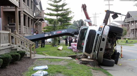 A crane tipped and hit an off-campus rental property on Chittenden Avenue July 31.  Credit: Chelsea Spears / Multimedia Editor