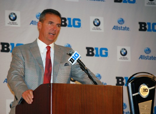 OSU football coach Urban Meyer addresses the media at the 2014 Big Ten Media Days July 28 in Chicago. Meyer was involved with one of 22 self-reported NCAA violations by OSU in the first half of 2014. Credit: Tim Moody / Lantern sports editor
