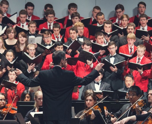 Robert Ward conducts the School of Music's combined choir in a performance of Handel's "Hallelujah Chorus." Credit: Courtesy of Nick Fancher 
