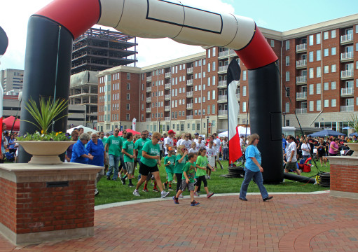 Participants of Walk to Defeat ALS make their way around Columbus Commons on Sept. 21. More than 2,000 students, patients, family and community members walked more than a mile to raise awareness and provide funding for ALS research.