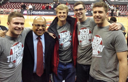 From left: Michael Duffy, ESPN analyst Mike Tirico, Logan Jones, Jake Johnson and Greg Greve pose before an OSU basketball game against Michigan on Feb. 11 at the Schottenstein Center. Credit: Courtesy of Jake Johnson