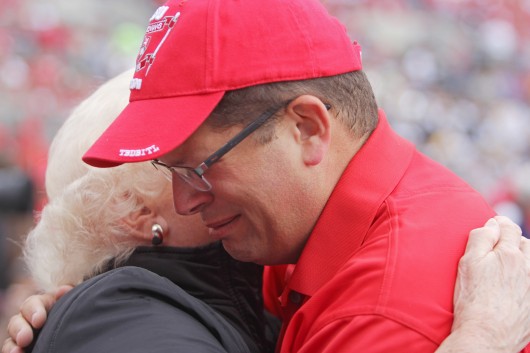 Former OSU Marching Band director Jonathan Waters tears up after the halftime show against Kent State on Sept. 13 at Ohio Stadium. Waters directed the alumni band at points throughout the game but did not march in the halftime show. Credit: Chelsea Spears / Multimedia editor