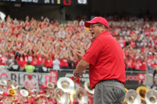 Former OSU Marching Band director directs the alumni band during Sept. 13's game against Kent State. Credit: Mark Batke / Photo editor