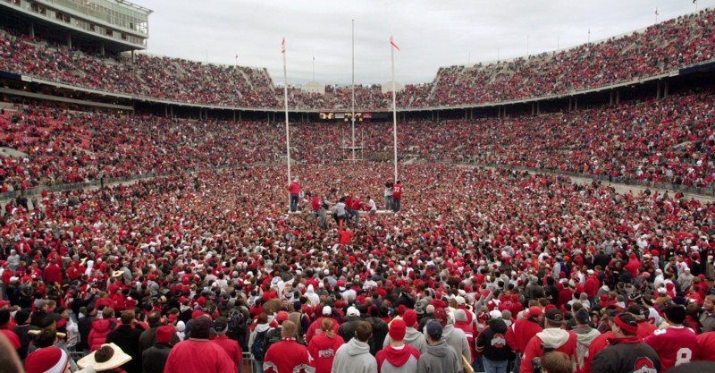 Fans rush the field at Ohio Stadium following a 14-9 OSU victory against Michigan on Nov. 23, 2002. Credit: Courtesy of John Kuntz / The Plain Dealer