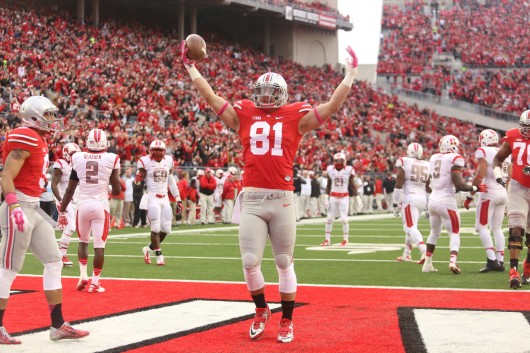 Redshirt-junior tight end Nick Vannett (81) celebrates after one of his 2 1st-half touchdowns during a game against Rutgers on Oct. 18 at Ohio Stadium. OSU won, 56-17. Credit: Mark Batke / Photo editor