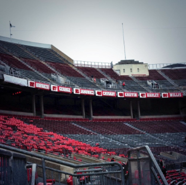 The eight names and numbers hanging up at Ohio Stadium honoring five Heisman Trophy winners and two OSU greats. Credit: Hayden Grove