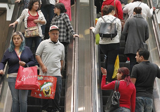 Black Friday shoppers at the Glendale Galleria crowd the escalators in Glendale, Calif., on Nov. 28. Credit: Courtesy of TNS