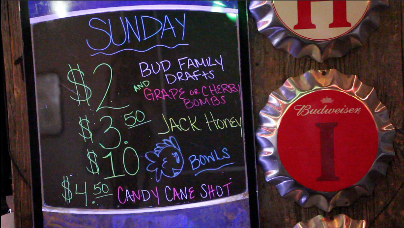 Drink specials are hung in a bar. Credit: Chelsea Spears / Multimedia editor