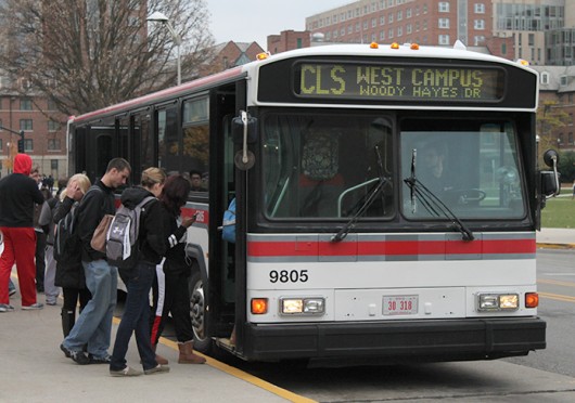 Passengers board a CABS bus heading north on College Avenue on Nov. 11 outside the Ohio Union. Credit: Taylor Cameron / Lantern photographer