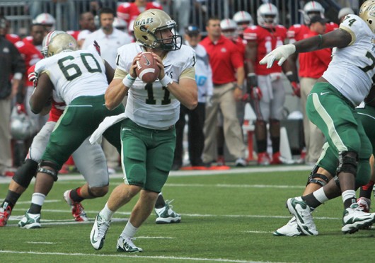 UAB's Then-redshirt-freshman quarterback Austin Brown (11) scans the field during a 29-15 loss to OSU on Sept. 22, 2012, at Ohio Stadium. Credit: Lantern file photo