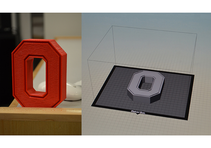 Red 3D print of Block-O next to a 3d rendering of the object on a computer screen