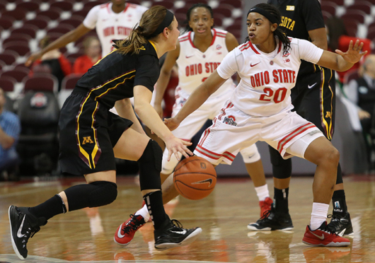 Freshman guard Asia Doss (20) plays defense during a game against Minnesota on Jan. 15 at the Schottenstein Center. OSU lost, 76-72. Credit: Mark Batke / Photo editor