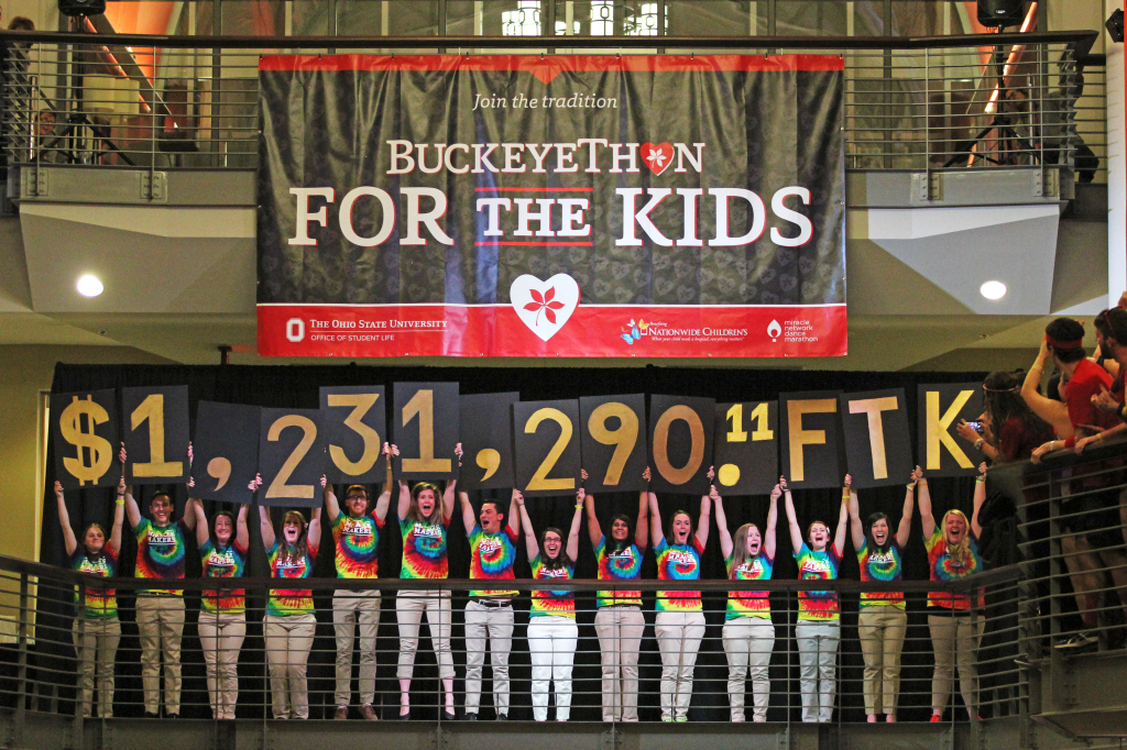 Students reveal BuckeyeThon's total fundraised amount of more than $1.23 million during the annual dance marathon's closing ceremonies on Feb. 7 at the Ohio Union. The total shattered the organization's goal of $1 million to donate toward fighting pediatric cancer at Nationwide Children's Hospital. Credit: Mark Batke / Photo editor