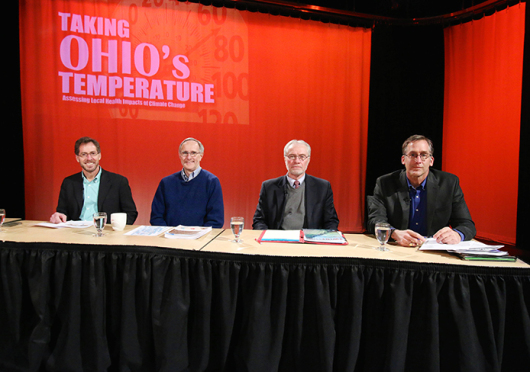Edward Maibach (left), David Bromwich, Jeffrey Reutter and Richard Hicks pose at a panel event on climate change at the WOSU studios at COSI in Columbus on Feb. 19. Credit: Yann Schreiber / Lantern reporter