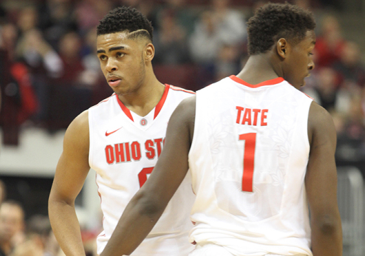 Freshman guard D'Angelo Russell (left) and freshman forward Jae'Sean Tate pause during a timeout during a game against Maryland on Jan. 29 at the Schottenstein Center. OSU won, 80-56.  Credit: Samantha Hollingshead / Lantern photographer