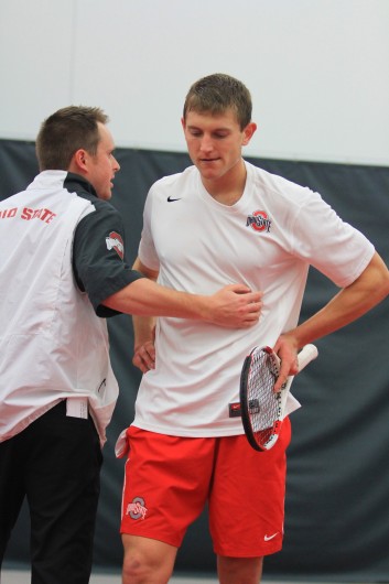 OSU redshirt-senior Kevin Metka (right) lost (6-7, 7-6, 6-7) in the final match of the Buckeyes' 4-3 loss to Oklahoma on March 6 at the Varsity Tennis Center. The loss snapped a 200-match home winning streak for OSU.  Credit: Samantha Hollingshead / Lantern photographer