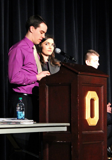 Noel Fisher (left), a third-year geography major, speaks to a crowd of OSU students with his running mate Michelle Bennett, a third-year public affairs major, during the USG candidate debate March 2 at The Ohio Union. Credit: AJ King / Lantern photographer