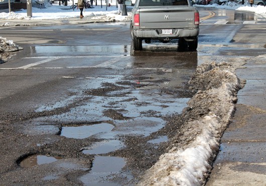 26,791 potholes from Nov. 1, 2014 to Feb. 25, 2015 have been mended by the Columbus Public Service Department. Student's can call 311 to report locations with potholes. Credit: Karlie Frank / Lantern photographer