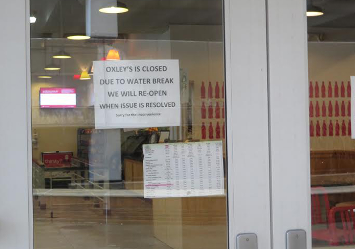 Oxley’s by the Numbers was closed Tuesday morning because of a water main break on Neil Avenue. Credit: Amanda Etchison / Campus editor