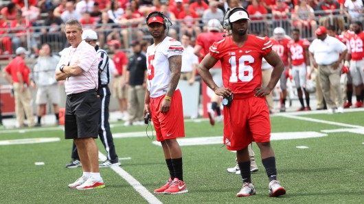 Redshirt-senior Braxton Miller (5) and redshirt-sophomore J.T. Barrett (16) were both held out of OSU's Spring Game on April 18 while rehabbing injuries.  Credit: Samantha Hollingshead / Lantern Photographer