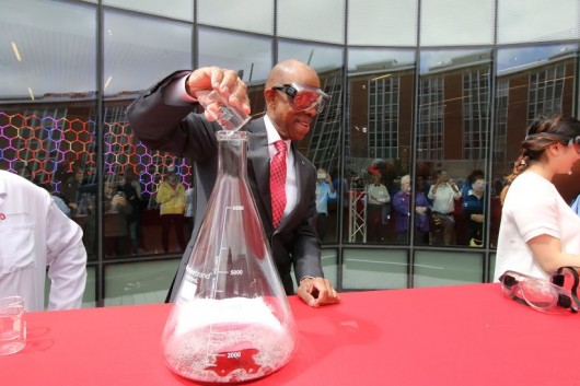 In place of a ribbon cutting ceremony, the CBEC opening celebration ended with a science experiment. OSU President Michael Drake helped to create the exothermic reaction that resulted in four foam-like eruptions and a hearty applause from attendees. Credit: Yann Schreiber / Lantern reporter