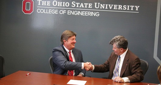 Steve Wathen (left), chairman and co-founder of the Youth Aviation Aventure Program, and David Williams, dean of the College of Engineering, sign the memorandum of understanding between the Youth Aviation Adventure Program and OSU’s Career Eagles Program in Hitchcock Hall on April 7. Credit: Yann Schreiber / Lantern reporter