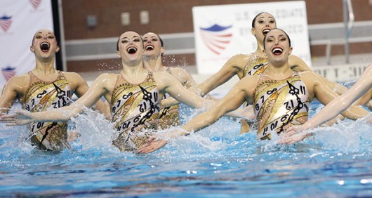 Members of the OSU synchronized swimming team compete in the U.S. Collegiate National Championships on March 28 at McCorkle Aquatic Pavilion. The Buckeyes clinched their 29th national title in program history. Credit: Mark Batke / Photo editor