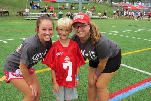 "Kick-it-all Star" Reid Zupanc (middle) poses for a photo with Mary Stoll (left) and Sarah Scheiwiller during last year's kickball tournament. Photos courtesy of Katie Widman