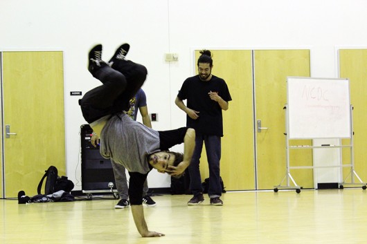 Members of the Ohio State Bboy Club show off some of their moves. Credit: Zak Kolesar | For The Lantern