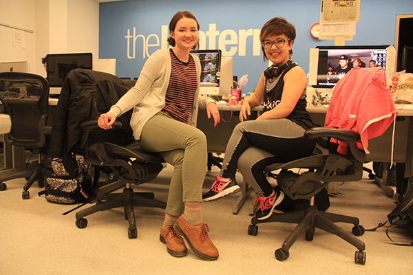 Arts Editors Hannah Herner and Sallee Ann Ruibal pose for a picture in The Lantern Newsroom. Credit: Kevin Stankiewicz | Assistant Sports Editor 