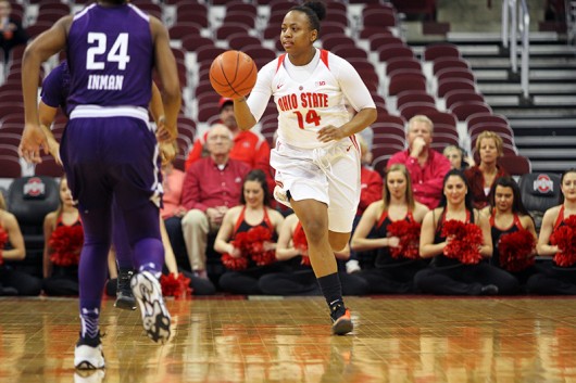 OSU senior guard Ameryst Alston (14) dribbles the ball during a game against Northwestern on Jan. 28 at the Schottenstein Center. Credit: Samantha Hollingshead | Photo Editor 