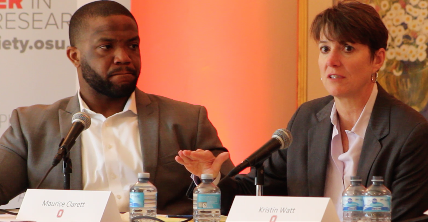 Former OSU basketball player Kristin Watt (right) speaks at a forum about paying college athletes while former OSU running back Maurice Clarett (left) listens. Credit: Mitch Hooper | Lantern reporter 