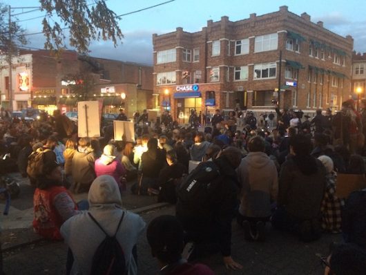 Anti-Donald Trump protestors block part of the intersection of North High Street and East 12th Avenue on Nov. 11. Credit: Nick Roll | Campus Editor