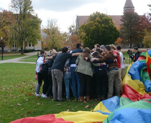 Students from various political backgrounds gather for a group hug on the Oval on Nov. 11. Credit: Kevin Stankiewicz | Oller Reporter 