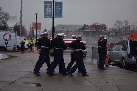 Marines carry John Glenn's casket out of the ceremony held for him at the Mershon Auditorium on Dec. 17. Credit: Sheridan Hendrix | For The Lantern